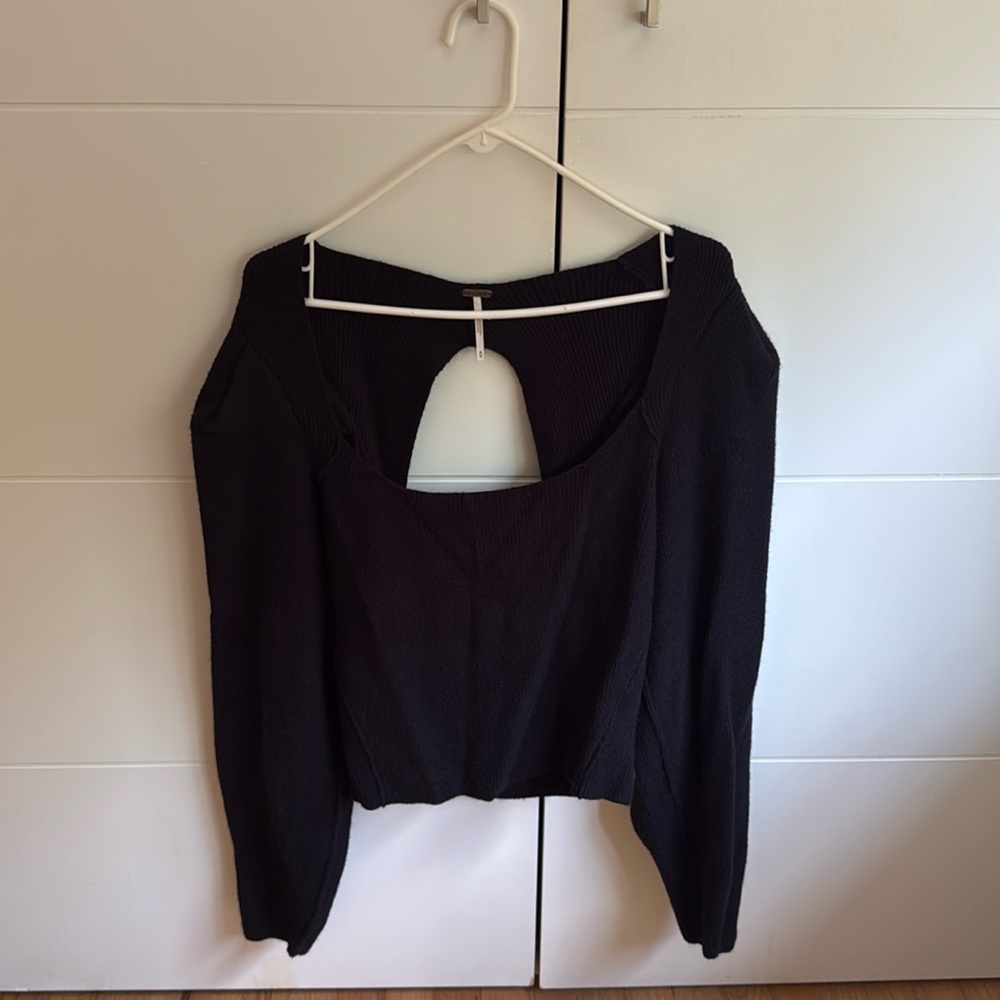 Free people black boat neck sweater. Open back size M